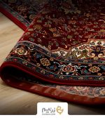 فرش کناره کاشان 700 شانه طرح هریس رنگ‌ لاکی