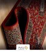 فرش کناره 700 شانه طرح کاشان رنگ‌ لاکی